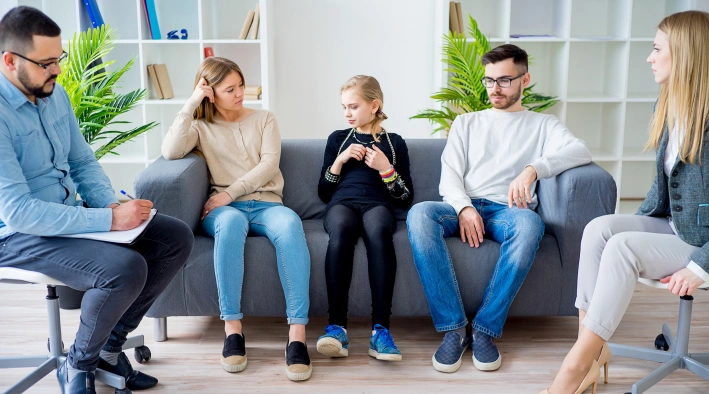 Family therapy session improving relationships and emotional bonding at Existence Clinics.