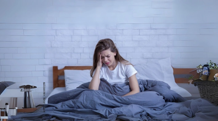 Therapist helping woman overcome insomnia and sleep issues through therapy at Existence Clinics.