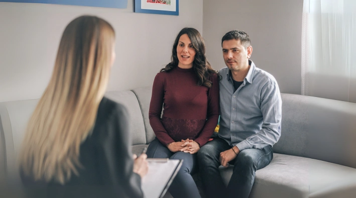 Couple in counseling session working on emotional validation and mutual understanding at Existence Clinics.